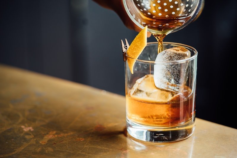 Aged Whiskey pouring in glass